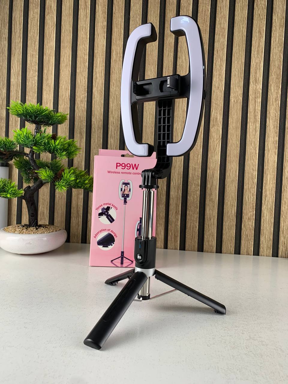 Extendable selfie stick with phone holder and LED light