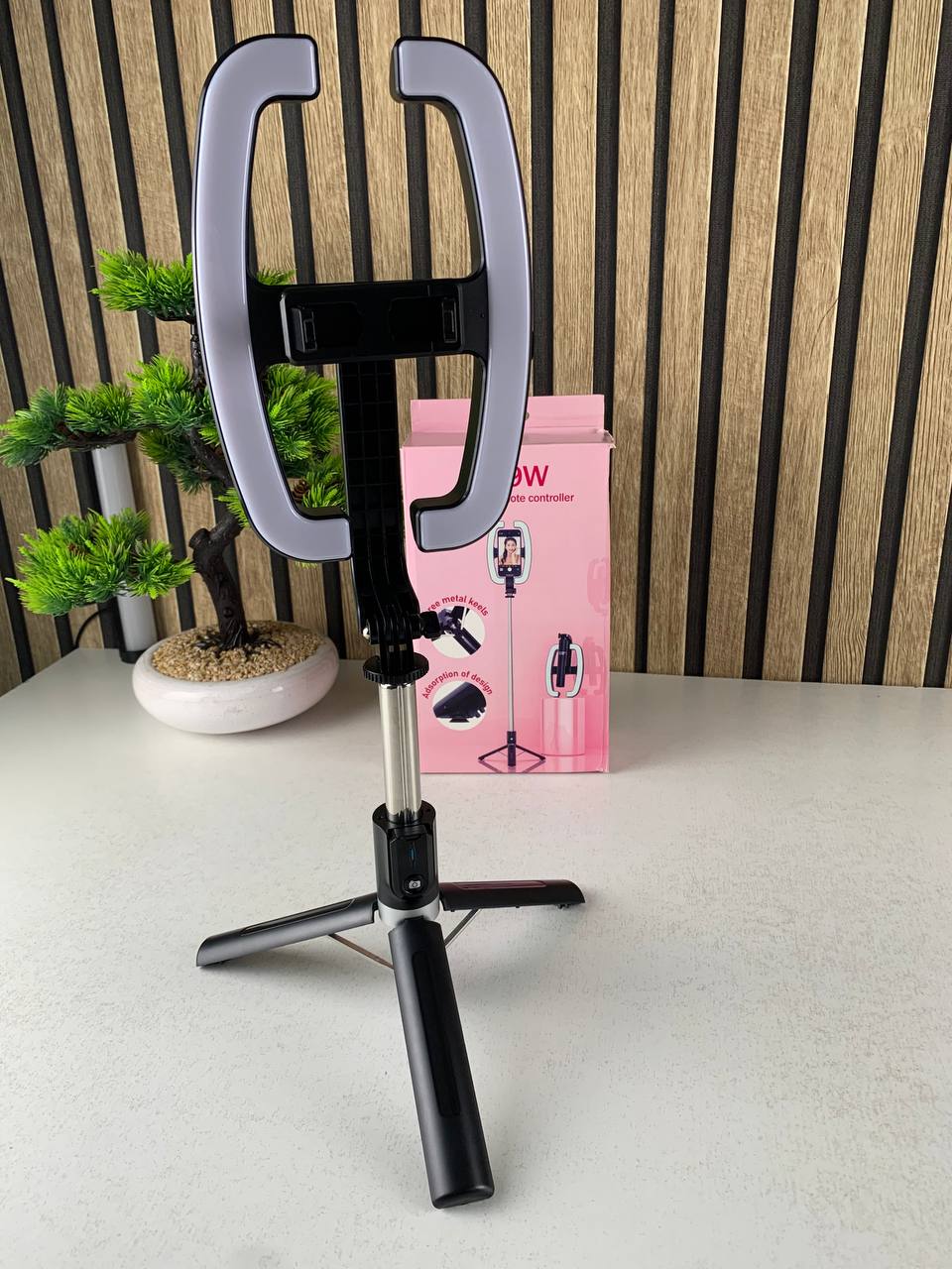 Extendable selfie stick with phone holder and LED light