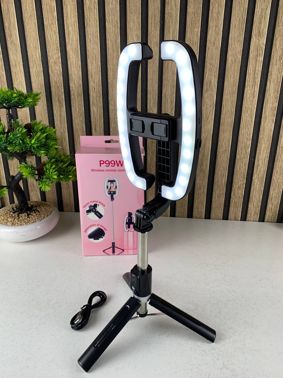 Extendable selfie stick with phone holder and LED light
