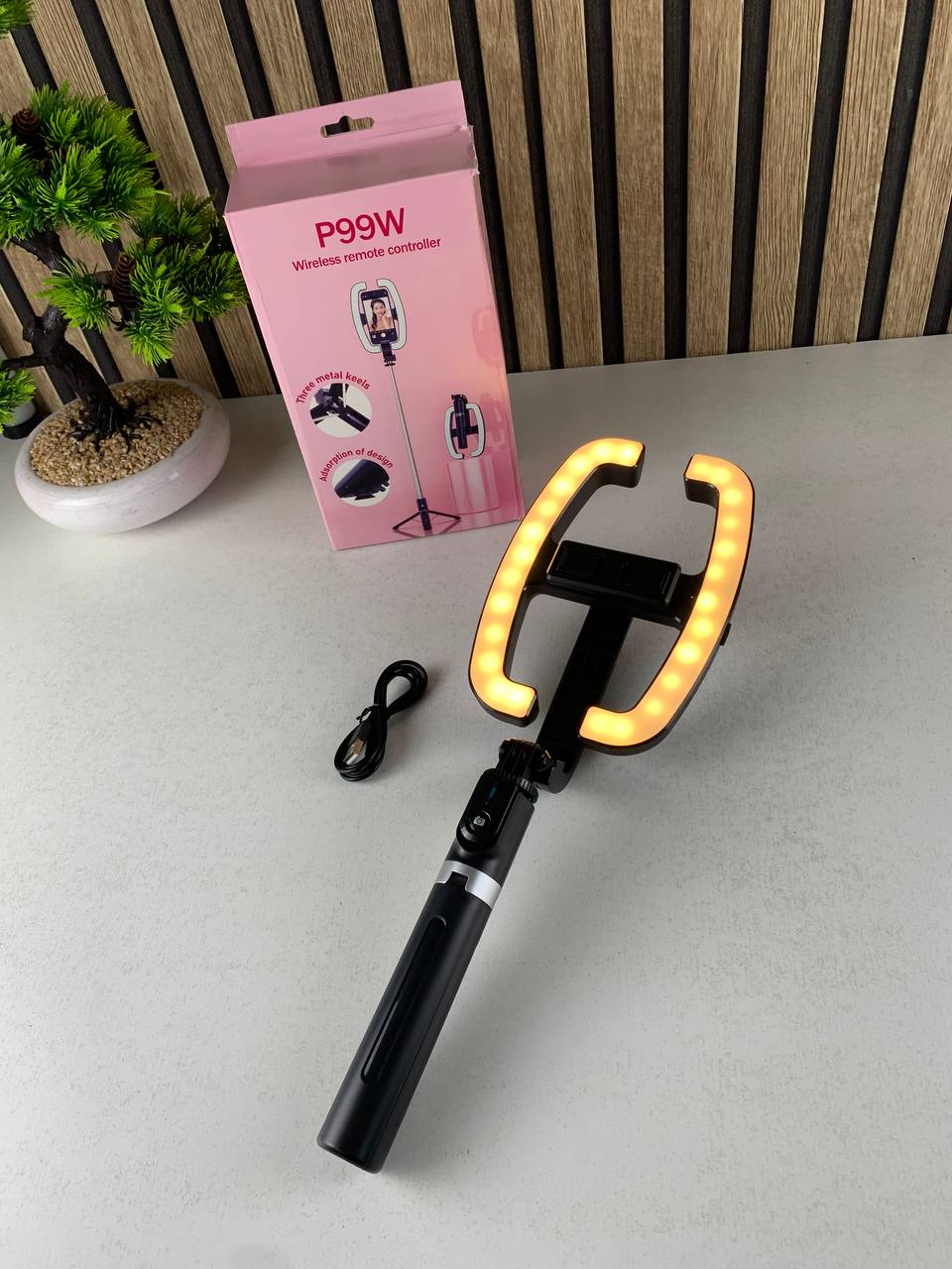 Extendable selfie stick with phone holder and LED light