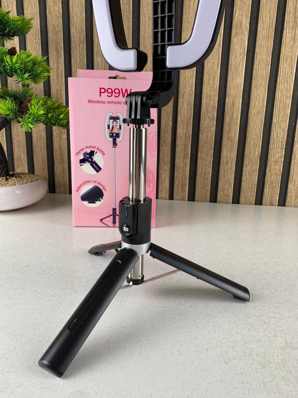 Extendable selfie stick with phone holder and LED light