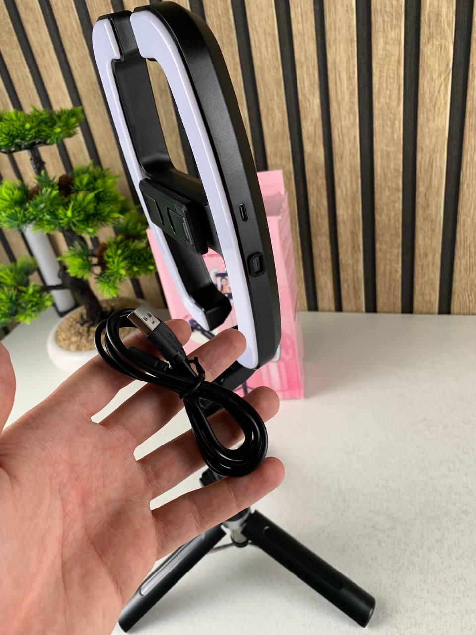 Extendable selfie stick with phone holder and LED light