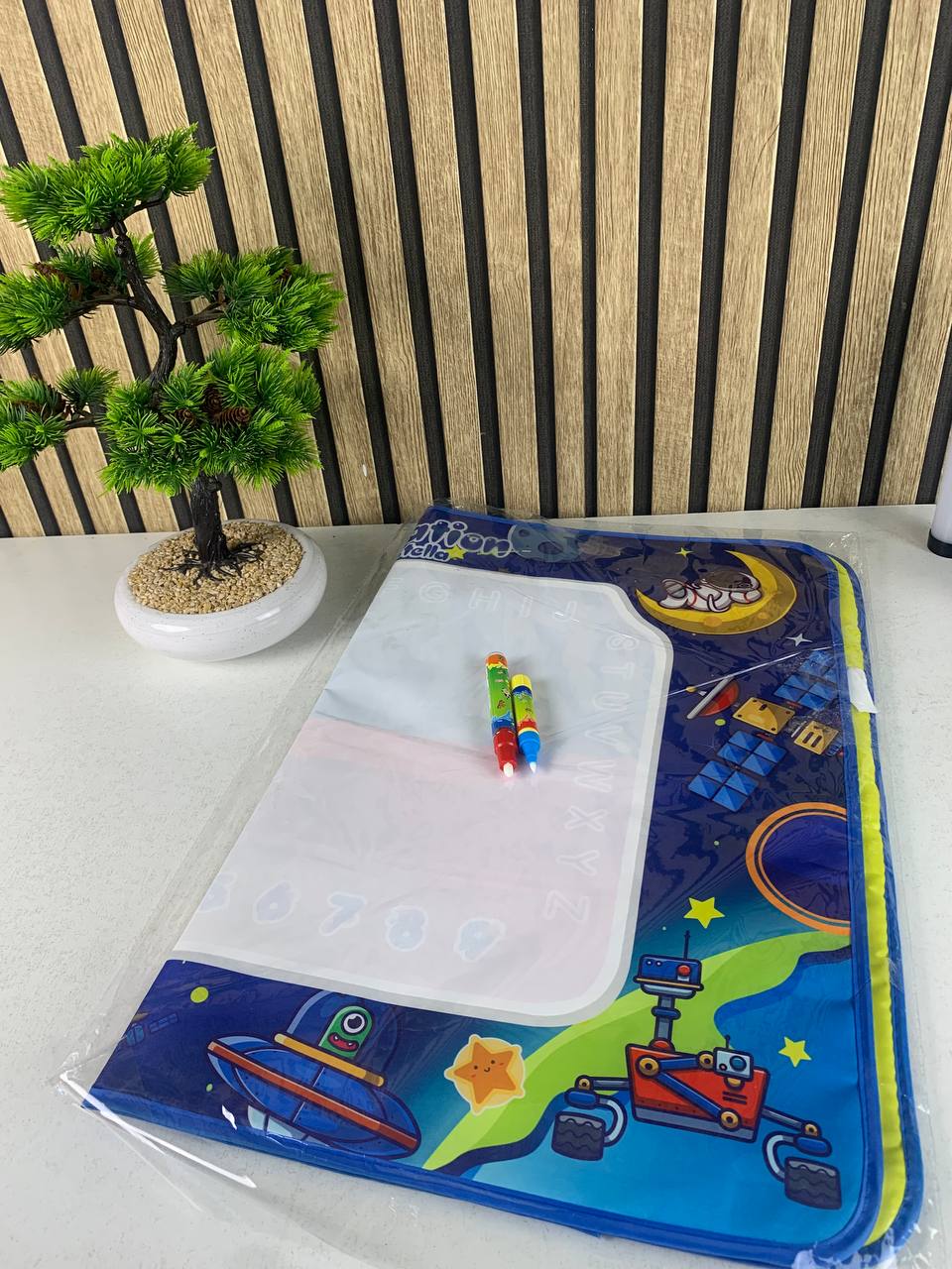 Reusable and washable water coloring mat for kids with alphanumeric practice area