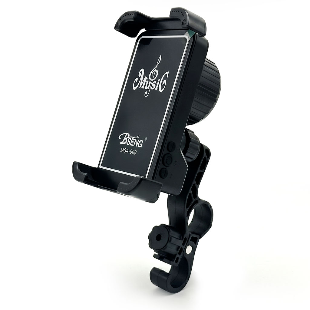 Phone stand with speaker and wireless charger